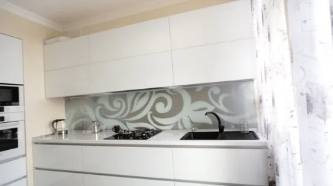 Luxurious white modern kitchen in a very beautiful new apartment Stock Footage 61507115