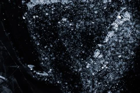 Luxury Abstract Glitter Texture with Bubbles on Deep Black Background Stock Photos