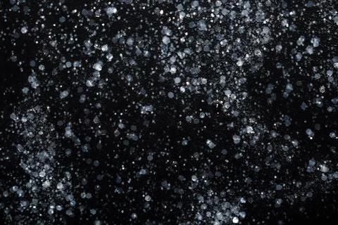 Luxury Abstract Glitter Texture with Bubbles on Deep Black Background Stock Photos