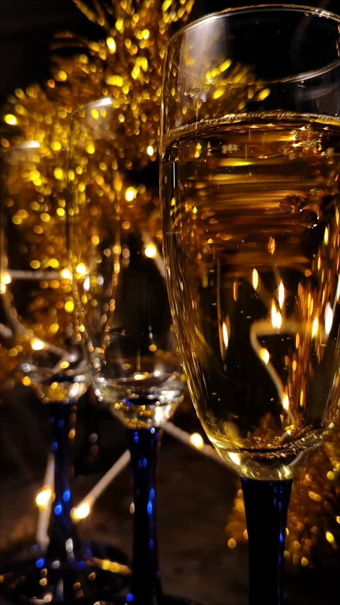 Luxury and elegance vertical background: Champagne bubbles on a glass Stock Footage 294760765