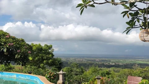 Luxury Bali Resort Infinity Pool Overlooking Lush Tropical Valley Landscape Stock Footage 340465414