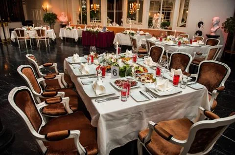 Luxury banquet table setting at restaurant Stock Photos