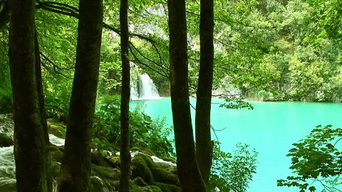Luxury Beach Oasis with Waterfall Stock Footage 278380304