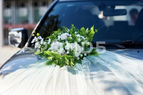 Luxury beautiful wedding car decorated with flowers Stock Photos
