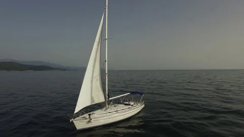 Luxury boat traveling on sea aerial view. Footage. Aerial view of the sailboat Stock Footage