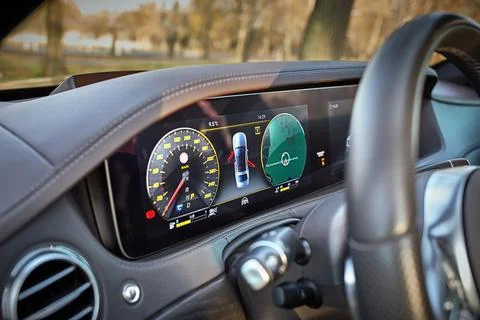 Luxury car digital dashboard with navigation display Stock Photos