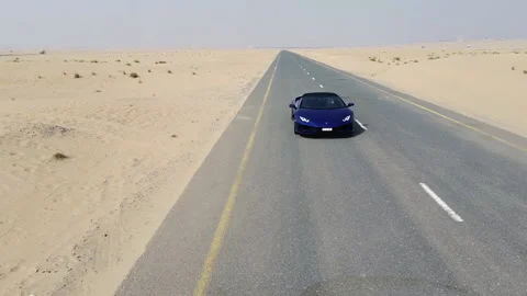 Luxury car on an empty road Stock-Footage 140669809