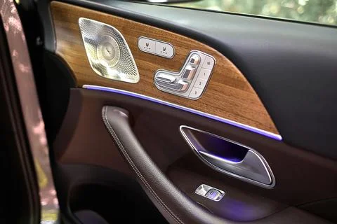 Luxury car interior door panel with ambient lighting Stock Photos