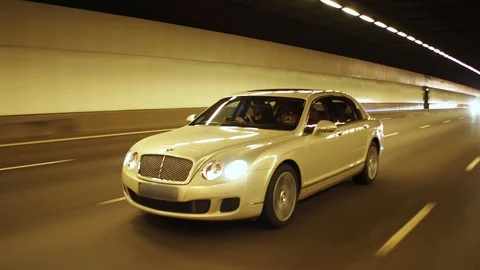 Luxury car models in tunnel Stock Footage