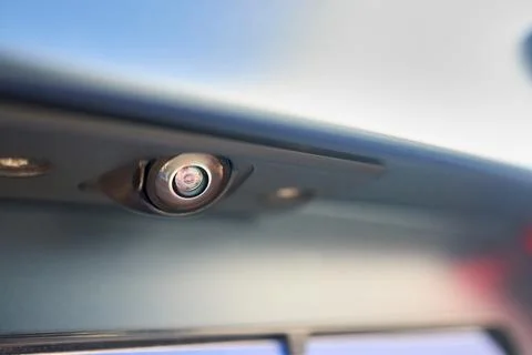 Luxury car rear view camera for parking assistance selective focus close up with Stock Photos
