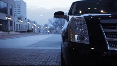 Luxury Car/Automobile Headlight, Parked on Empty Street Stock Footage 102404360