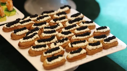 Luxury caviar canaps platter for upscale catering events Stock Footage 327013905
