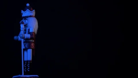 Luxury Christmas- red nutcracker in blue light left 4k Stock Footage 98314581