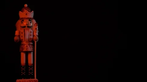 Luxury Christmas- red nutcracker in red light left 4k Stock Footage 98315235