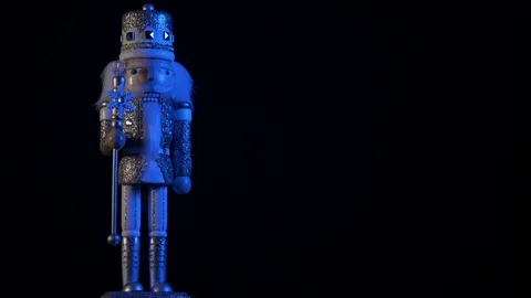 Luxury Christmas- silver nutcracker in blue light left 4k Stock Footage 98315369