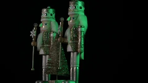 Luxury Christmas theme for malls silver nutcrackers in green light 4k Stock Footage 98201213