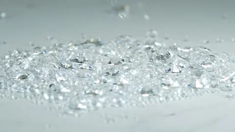 Luxury Diamonds Rotating on White Background 4K. Precious Diamonds Falling 스톡 동영상 334849522