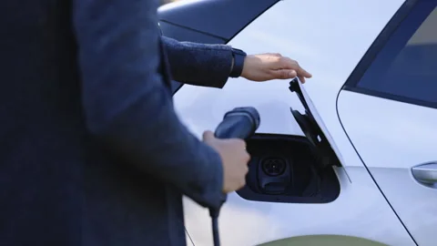 Luxury electrical car full. Electrical power filling compete and cable Vídeos de archivo 249876746