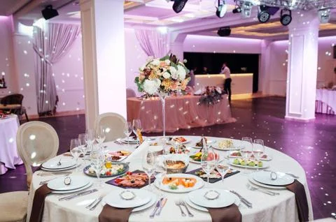 Luxury, elegant wedding reception table arrangement, floral centerpiece Stock Photos