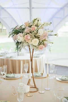 Luxury, elegant wedding reception table arrangement, floral centerpiece Stock Photos