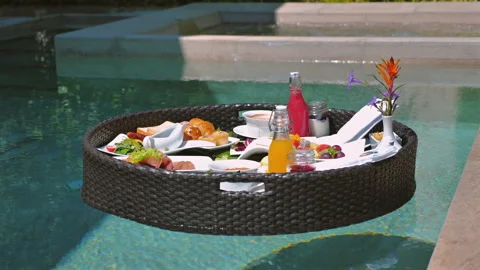Luxury floating breakfast set in private pool Video stock 274892511
