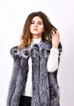 Luxury fur accessory clothes. Fashion trend concept. Winter fashionable wardrobe Stock Photos
