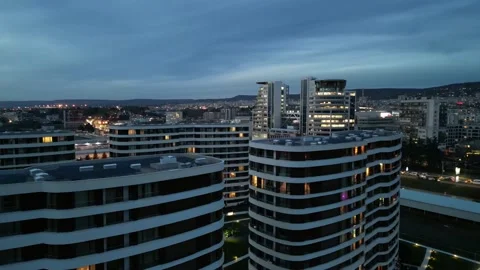 Luxury gated complex and night city with drone view from above Stock Footage 230955215