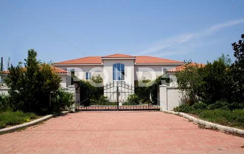 Luxury gated mansion Stock Photos