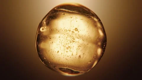 Luxury golden serum liquid bubble. Beauty cosmetics macro 3D abstract background Video stock 336560877