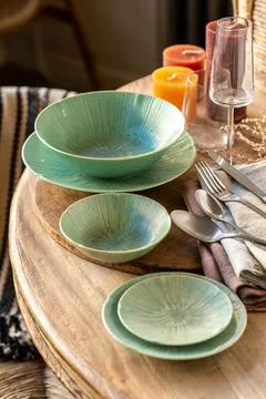 Luxury Green Ceramic Dinnerware Set on Rustic Wooden Table Stock Photos