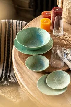 Luxury Green Ceramic Dinnerware Set on Rustic Wooden Table Stock Photos