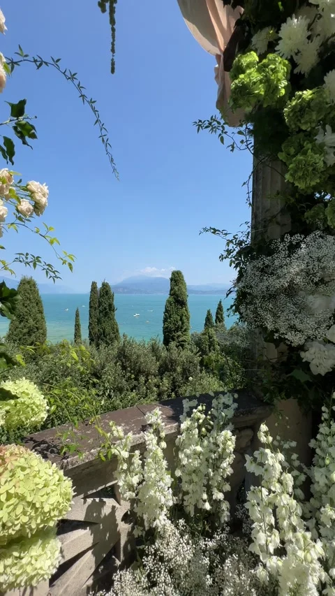 Luxury green white classical wedding decor hortensia Italian villa Garda lake Stock Footage 297868424