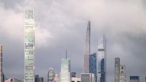 Luxury high-rises in mid-town Manhattan NYC surrounded by clouds. Stock Footage 341362545