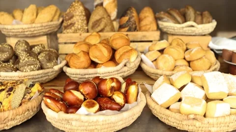 Luxury hotel breakfast buffet or bakery market with fresh baked bread rolls Stock Footage 306543455