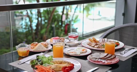 Luxury Hotel Breakfast Buffet with Pool View - Holiday Dining Stock Footage 327873432