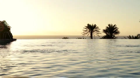 Luxury Hotel Pool during sunset Stock Footage 1068824