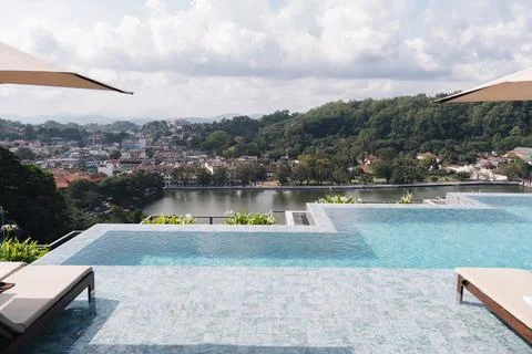 Luxury infinity pool overlooking Kandy city and lake in Sri Lanka 写真素材