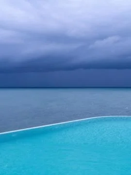 Luxury Infinity Pool Overlooking Lush Greenery Stock Photos