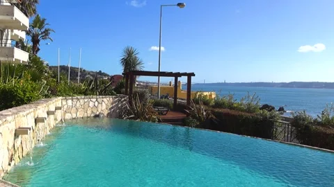 Luxury Infinity Pool Overlooking the Tagus River in Lisbon Stock Footage 335189983
