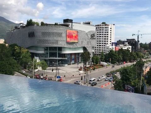 Luxury infinity swimming pool with view of Chiang Mai downtown Stock Footage 79191769