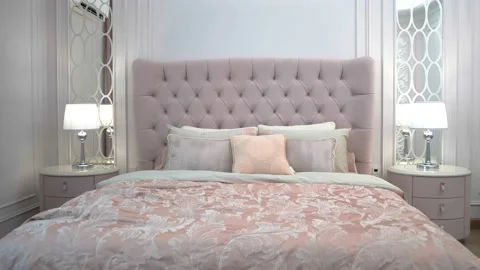 Luxury interior of a bedroom with an expensive bed in a luxury hotel suite Stock Footage 159807051