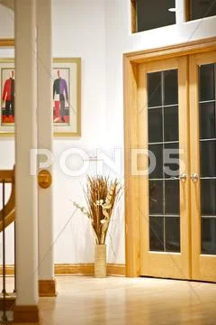Luxury interior - hardwood floor and wood doors. Stock Photos