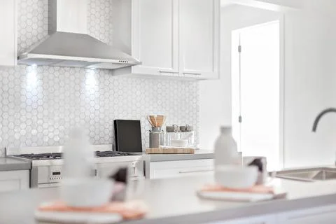 Luxury kitchen with silver chimney also  door opened Stock Photos
