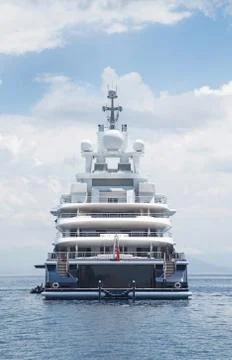 Luxury large super or mega motor yacht in the blue sea. Stock Photos
