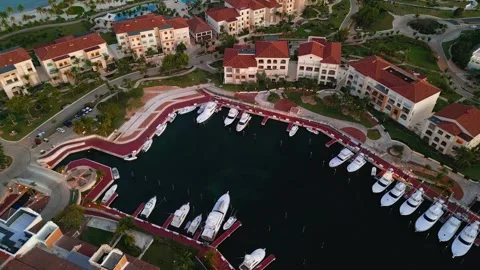 Luxury Marina with Yachts at Sunset in Cap Cana, Dominican Republic. Aerial view Stock Footage 311993053