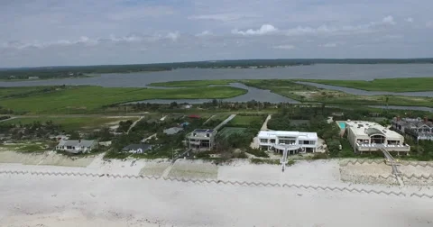 Luxury oceanfront Homes Between Ocean and Coastal Salt Marsh Stock-Footage 59523260