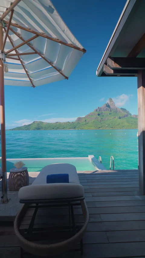 Luxury Overwater Bungalow Deck with Infinity Pool and Mount Otemanu View. Stock Footage 342212195