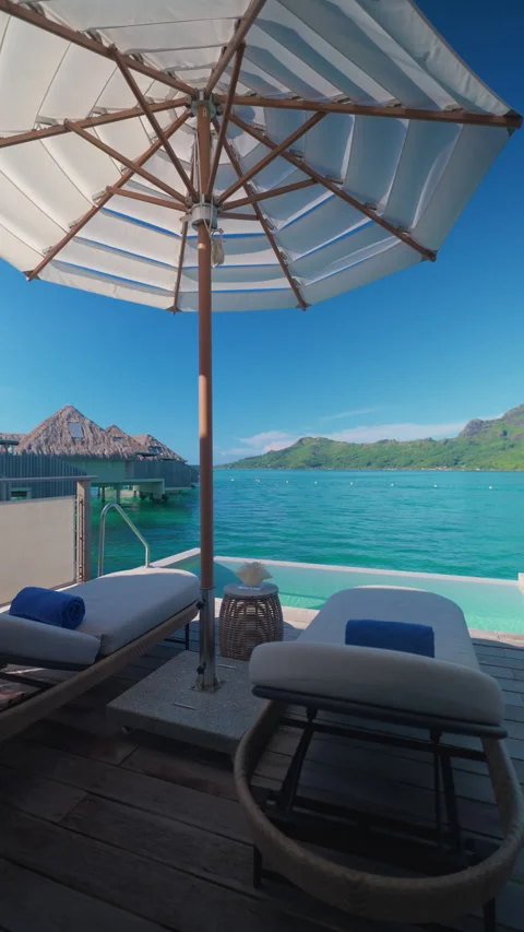Luxury Overwater Bungalow Deck with Infinity Pool and Mount Otemanu in Bora. Stock Footage 342213585