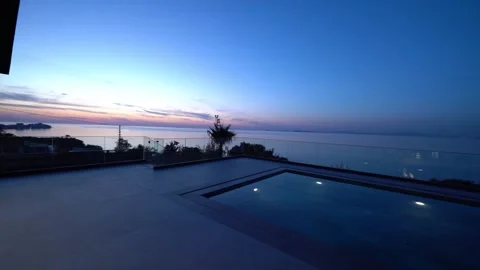 Luxury Panorama Pool View at Sunset by the Sea Vídeos de archivo 310237527