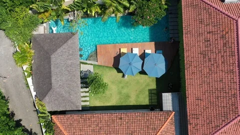 A luxury pool in the back yard of a Balinese Villa. Stock Footage 101141204
